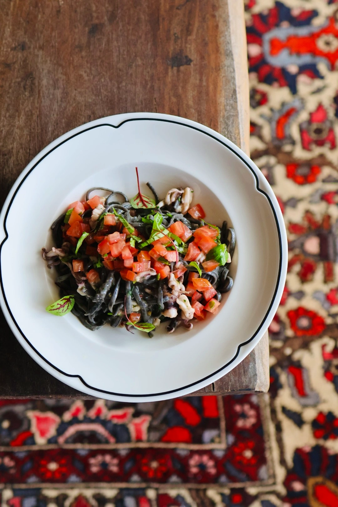 Barramundi, squid, and chorizo paella