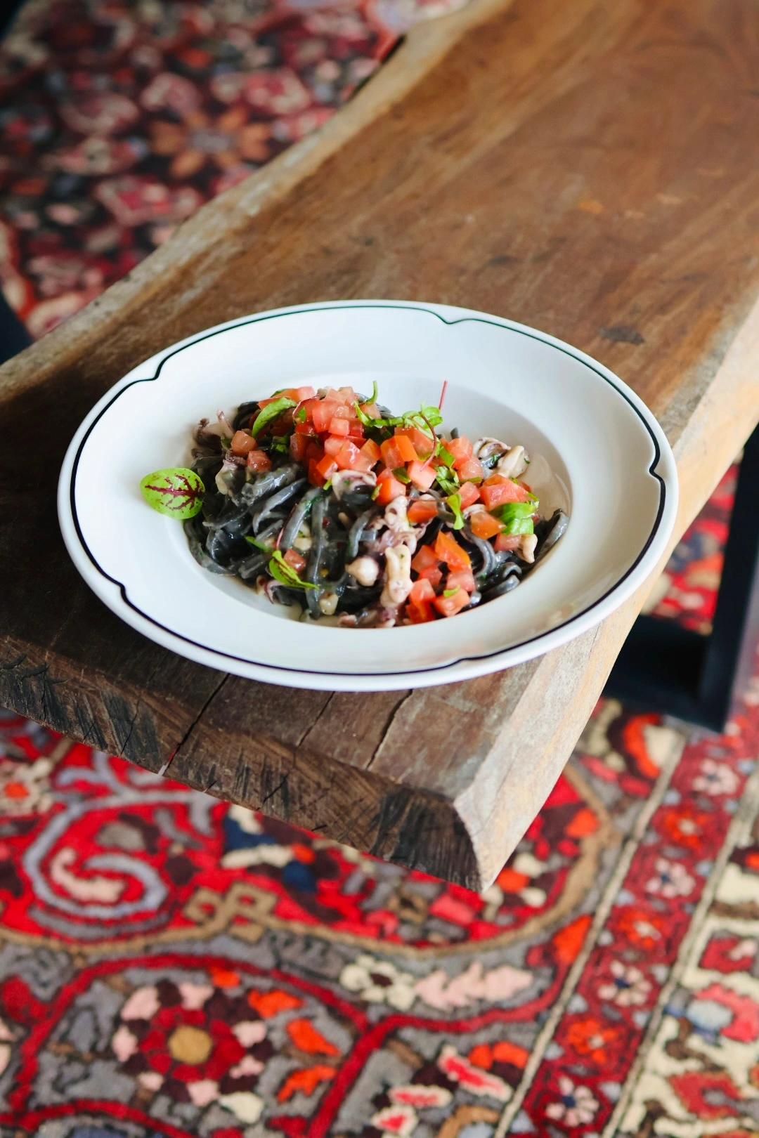 Barramundi, squid, and chorizo paella